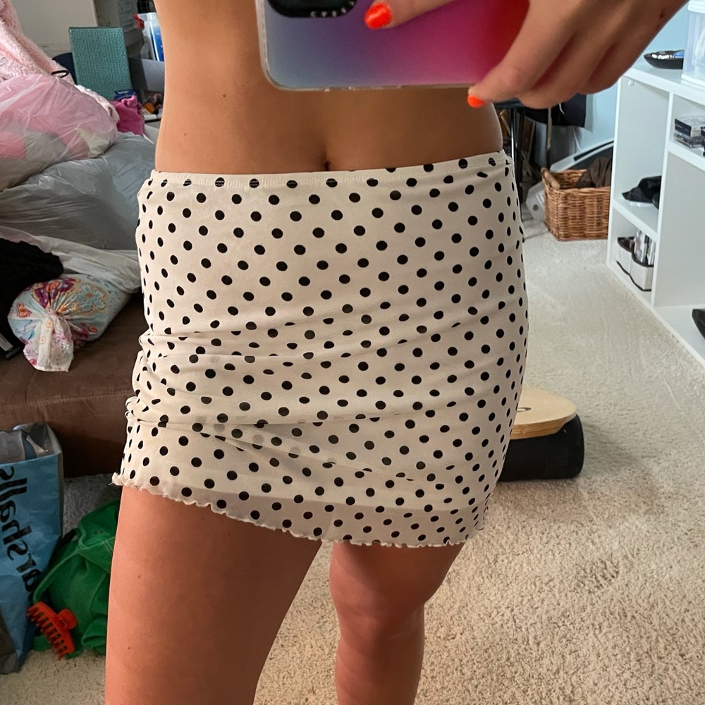 Worn once, super cute mini skirt with mesh overlay!